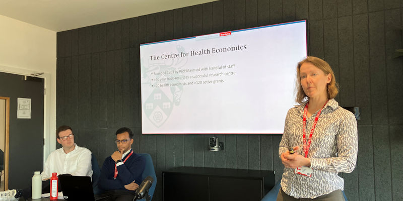 Susan Griffin presenting at EconFest 2024